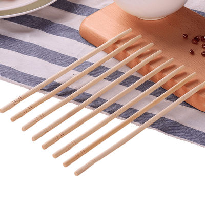 Bamboo redondo y desechable, bastones afilados, color natural, sostenible y desechable.